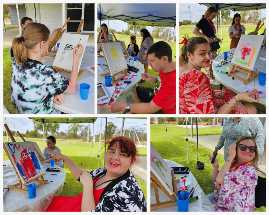Artists seated down at our speed painting competition painting a theme on their canvas using acrylic paint. 
