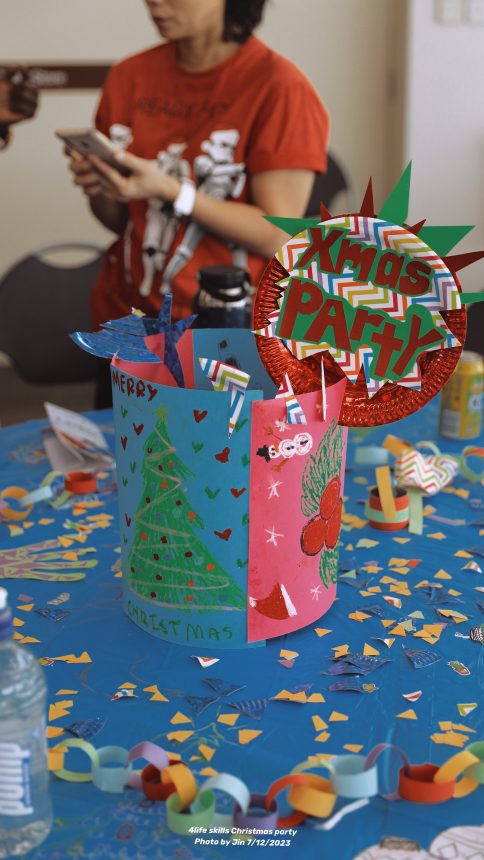 A colourful centerpiece created by our clients and support staff.